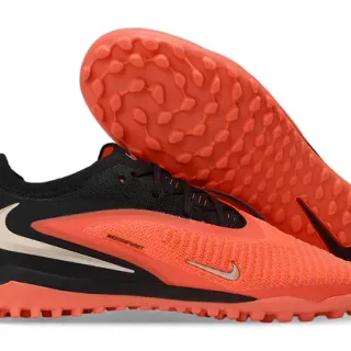 Nike Phantom GT Chaussures de football avec upper en tricot orange noir, lacets asymétriques pour turf
