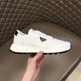 Prada Cloudbust White Black Leather-Like Upper Triangular Logo Patch Chunky Sneakers
