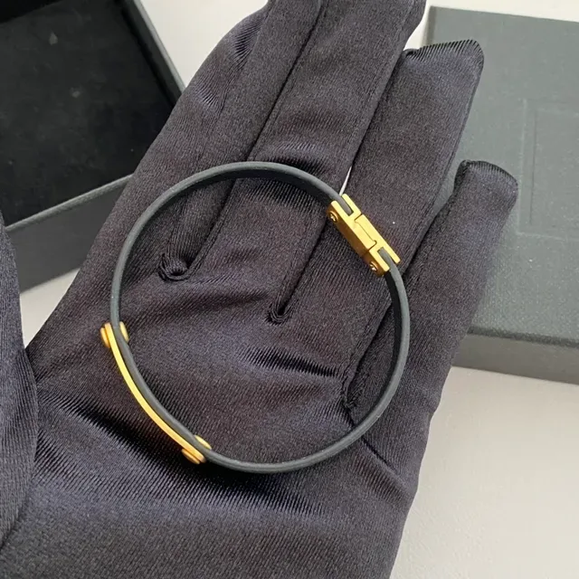 Saint Laurent Black Gold Rubber-Like Band H-Bar Clasp Bracelet 4