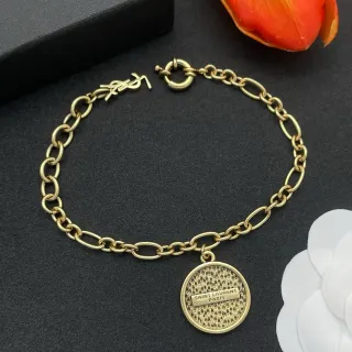 Saint Laurent गोल्ड टोन ओवल लिंक चार्म ब्रेसलेट