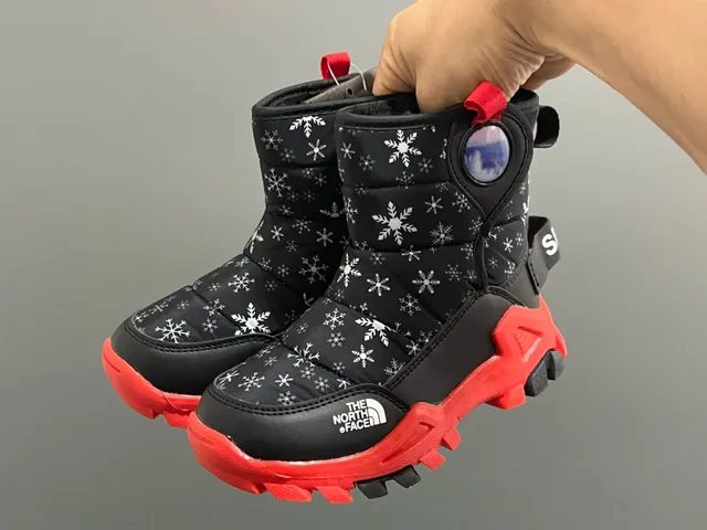 The North Face Botas de Nieve Azul Marino Aislante acolchado con estampado de copo de nieve 18