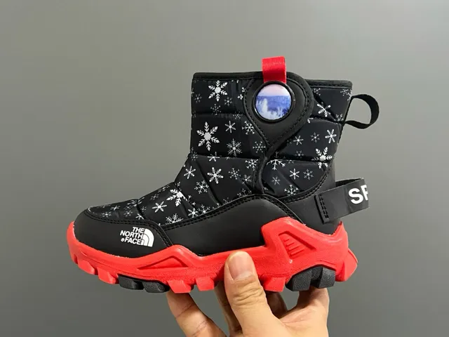 The North Face Botas de Nieve Azul Marino Aislante acolchado con estampado de copo de nieve 19