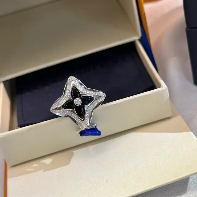 Tiffany & Co. 银蓝镂空星星图案抛光金属戒指 9