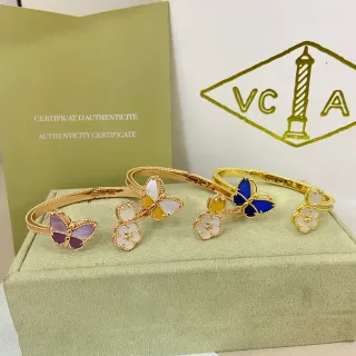 Van Cleef & Arpels Papillon and Alhambra Gold Butterfly and Flower Motif Bracelets