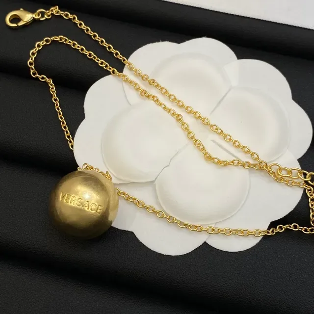 Versace Collier à pendentif sphérique doré 2