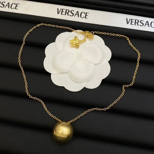 Versace Collier à pendentif sphérique doré 3