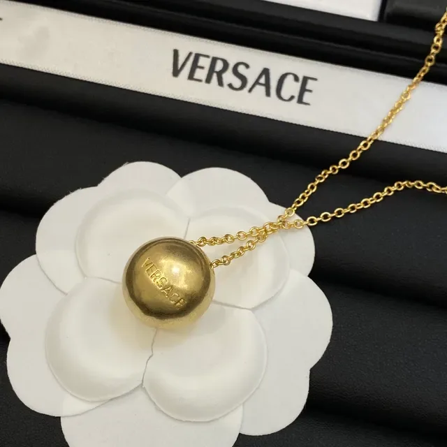 Versace Collier à pendentif sphérique doré 5