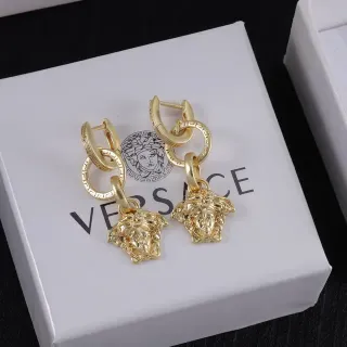 Versace Medusa Boucles d'oreilles à l'anneau double avec charm tête en or