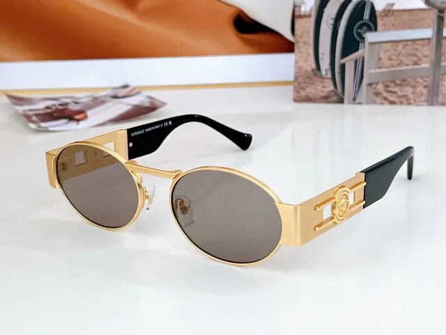 Versace Odissea Óculos de sol com lente ovalada dourada marrom e armação metálica 5
