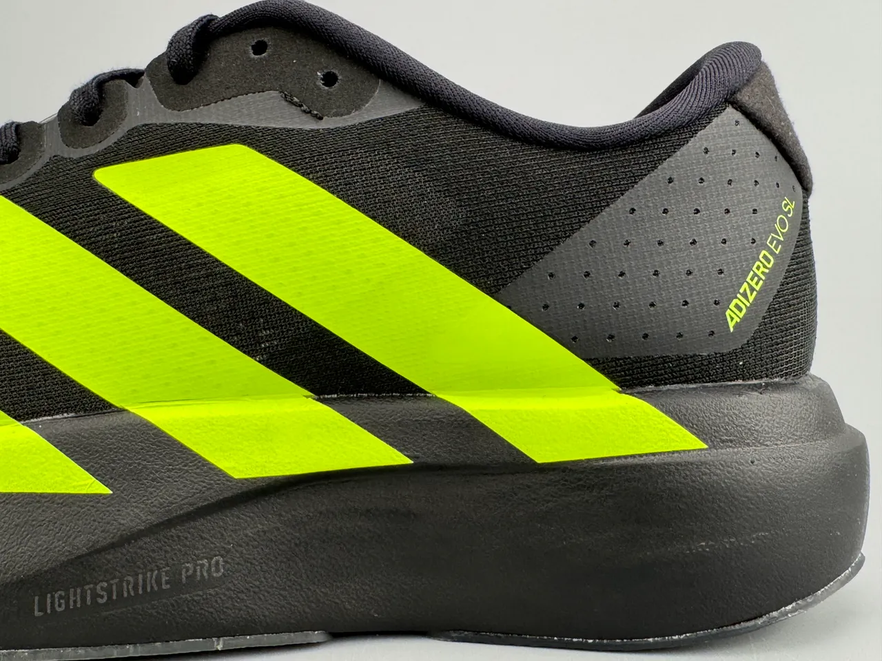 Adidas Adizero Evo SL أسود نيون أصفر أحذية جري 7