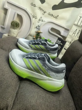 Adidas Chaussures de course avec upper tricoté gris vert, bandes gradient lime 7