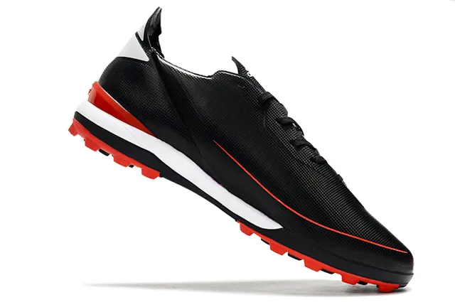 Adidas Zapatillas de fútbol para césped artificial de color naranja y negro con upper de sintético, cordones asimétricos y corte bajo 16