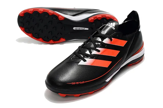 Adidas Zapatillas de fútbol para césped artificial de color naranja y negro con upper de sintético, cordones asimétricos y corte bajo 18