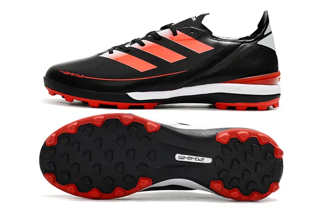 Adidas Zapatillas de fútbol para césped artificial de color naranja y negro con upper de sintético, cordones asimétricos y corte bajo 21