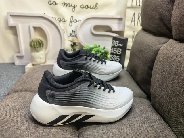 Adidas Chaussures Lifestyle Rose Noir Upper Texturé en Vague Semelle Médiane Sculptée Blanche 11