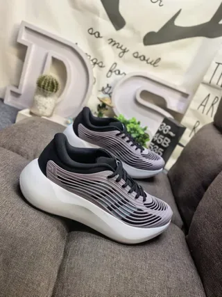 Adidas Chaussures Lifestyle Rose Noir Upper Texturé en Vague Semelle Médiane Sculptée Blanche 19