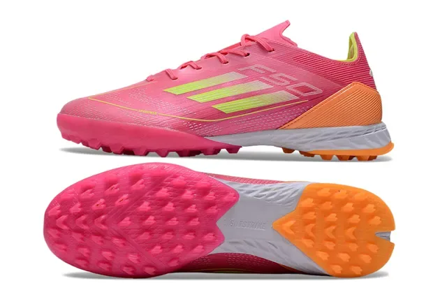 Adidas أحذية كرة قدم وردي برتقالي أعلى نسيج مخروطي المسامير للعشب الاصطناعي 6