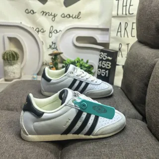 Adidas أبيض أسود منخفض مثقوبة في الرؤوس أسلوب حياة أحذية رياضية