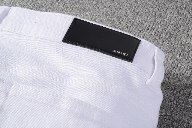 Amiri jeans skinny distressed brancos de denim 3