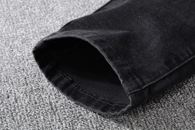 Amiri Calça Jeans Preta Slim-Fit com Desgaste 2