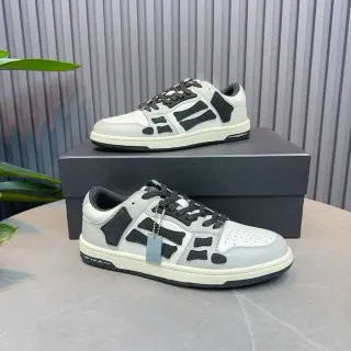 Amiri Skel Top Low হালকা ধূসর এবং কালো লাইফস্টাইল স্নিকার