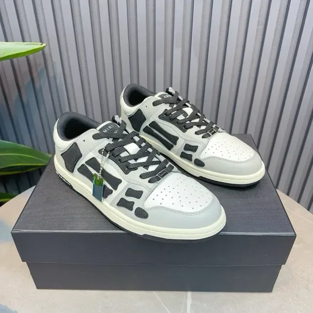 Amiri Skel Top Low হালকা ধূসর এবং কালো লাইফস্টাইল স্নিকার 3