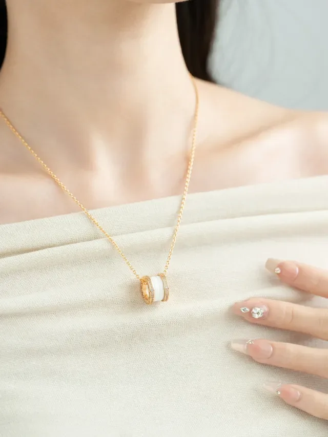 Bvlgari B.zero1 Gold Black Cylindrical Multi-Ring Pendant Pavé-Set Diamond Bezel Necklace 4