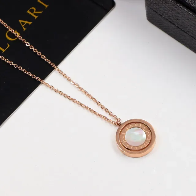 Bvlgari Collier en Or Blanc avec Inlay de Mère de Perle à Double Anneau Rotatif 5