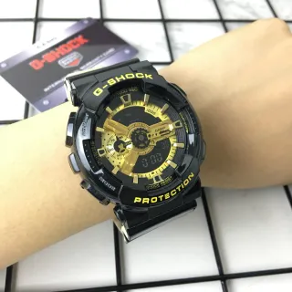 Casio G-Shock GA-100 Montre sportive noire et or