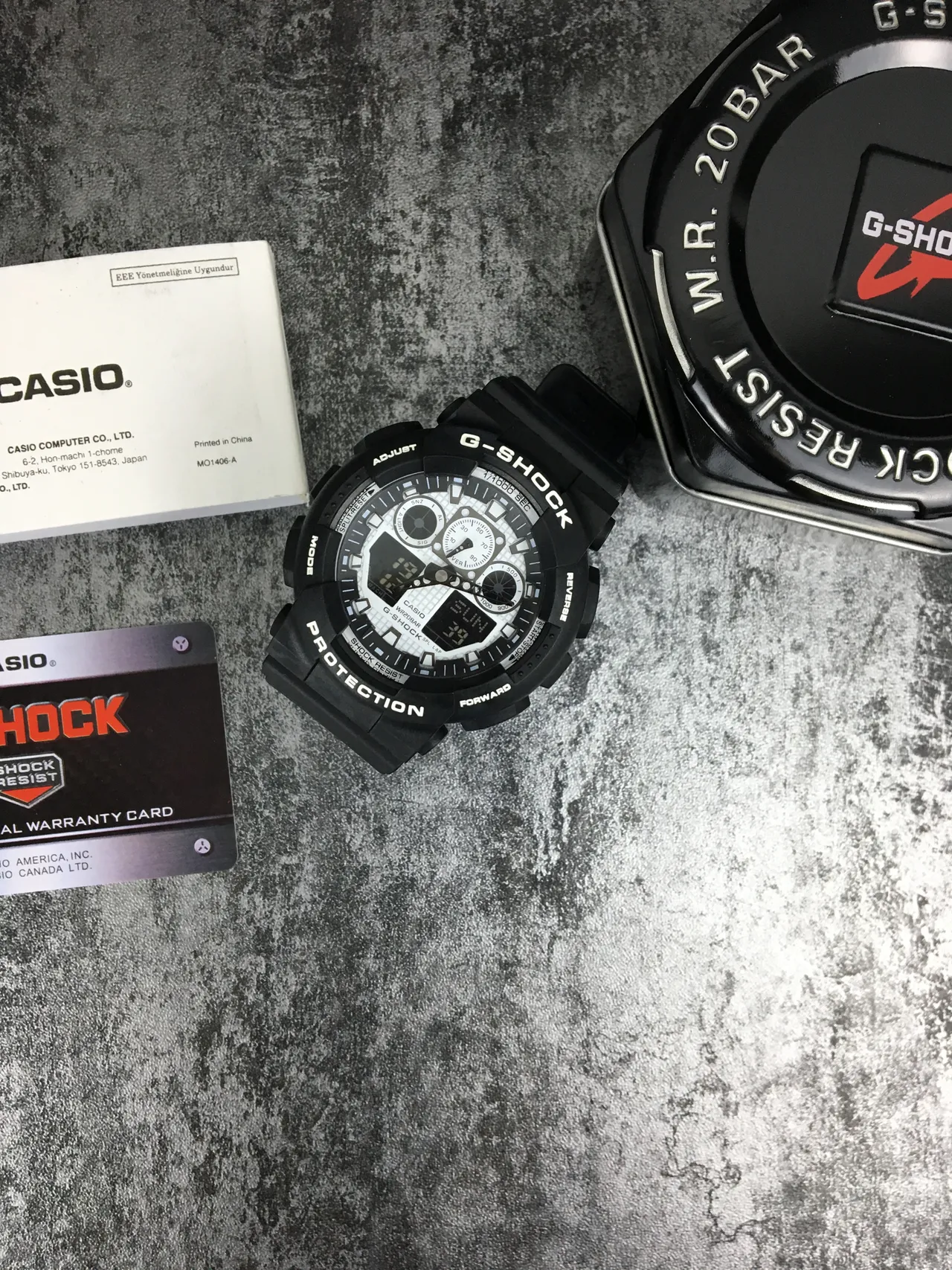 Casio G-Shock GA-100 Montre sportive noire et blanche 2