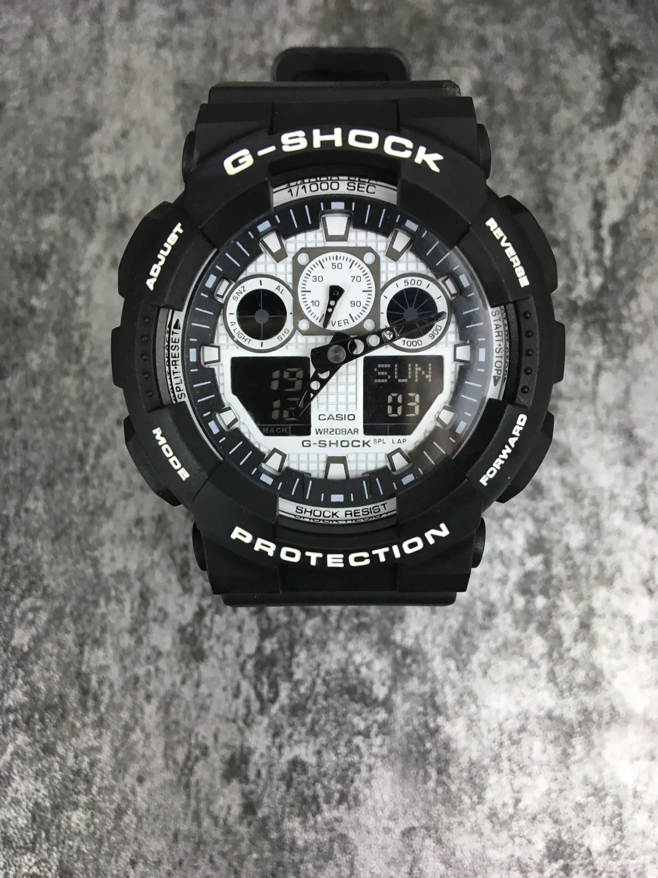 Casio G-Shock GA-100 Montre sportive noire et blanche 3