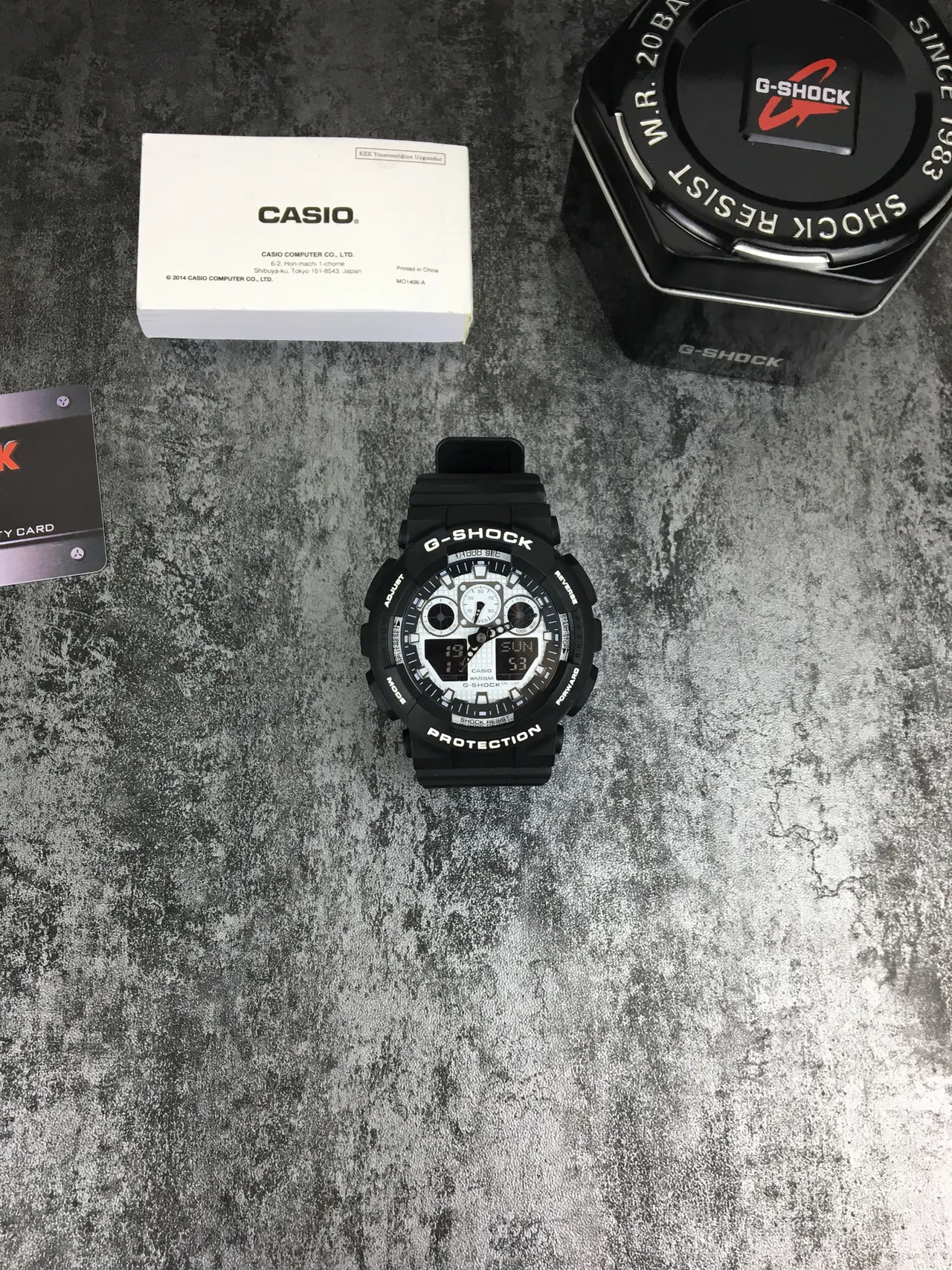 Casio G-Shock GA-100 Montre sportive noire et blanche 4