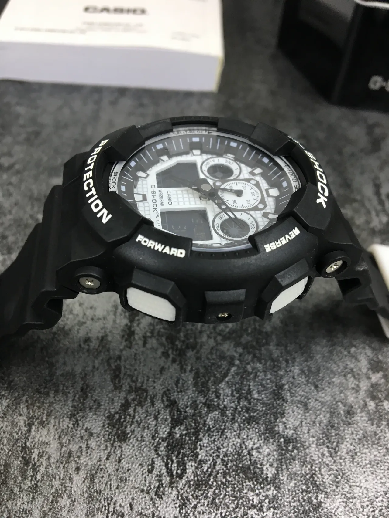Casio G-Shock GA-100 Montre sportive noire et blanche 5