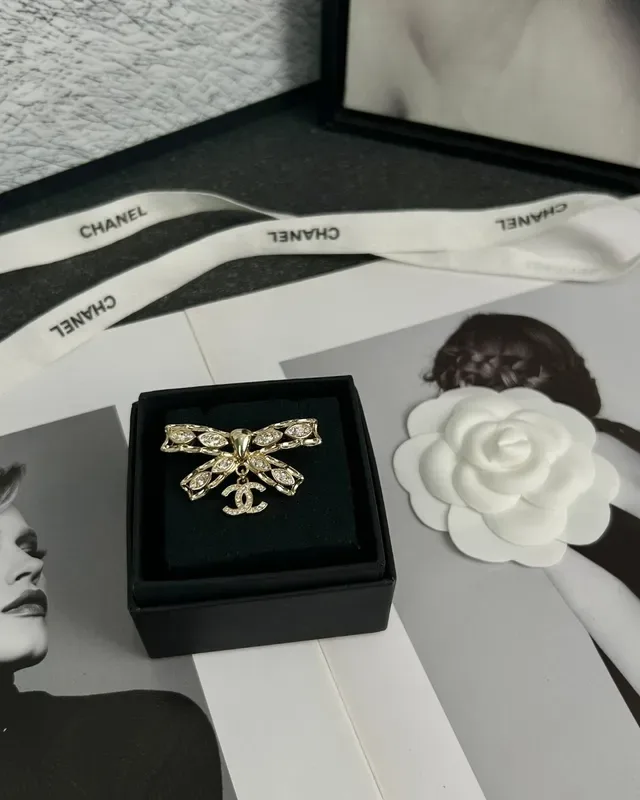 Chanel Bow-Shaped Crystal-Embellished Gold-Tone CC Logo Brooch 3