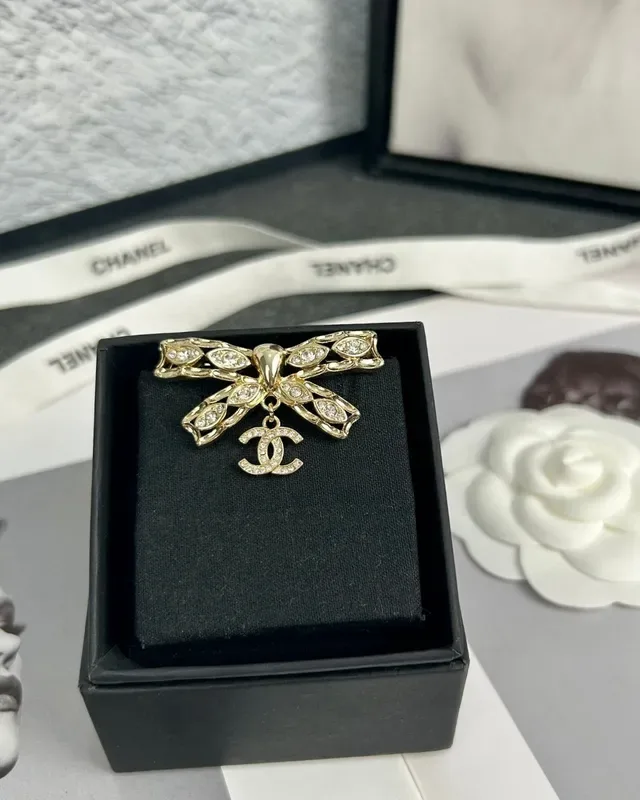 Chanel Bow-Shaped Crystal-Embellished Gold-Tone CC Logo Brooch 4
