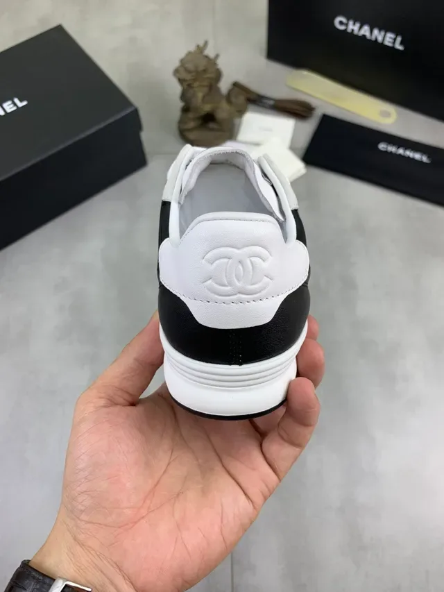 Chanel Quilted Black and White Lifestyle Sneakers 3
