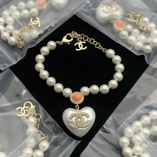 Chanel White Gold Pearl Strand Heart-Shaped Pendant Bracelet
