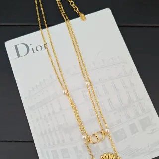 Dior Collier chaîne à plusieurs brins dorée et blanche avec accents de perles