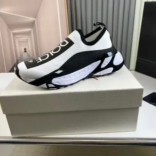 Dolce & Gabbana Sneakers Lifestyle Blanc et Noir avec Upper en Maille et Bande avec Logo Bold