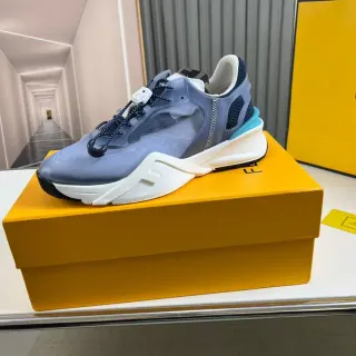 Fendi Sneakers Chunky Bleu Blanc avec Suela Sculptée et Overlay de Maille Translucide