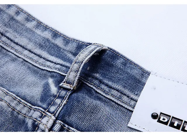 Shorts de Denim Azul Negro con Lavado Medio y Dobladillo Acanalado 8
