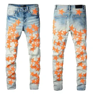 Jeans azul naranja lavado ligero distressed denim patrón de aplique de estrella