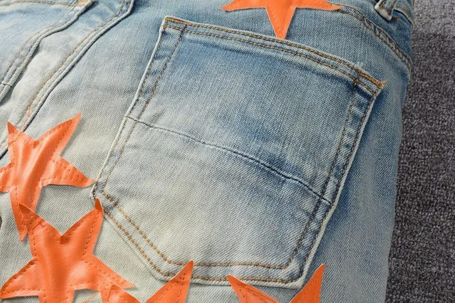 Jeans denim bleu orange lavé léger distressed motif appliqué étoile 5