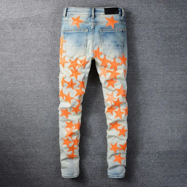 Jeans denim bleu orange lavé léger distressed motif appliqué étoile 9