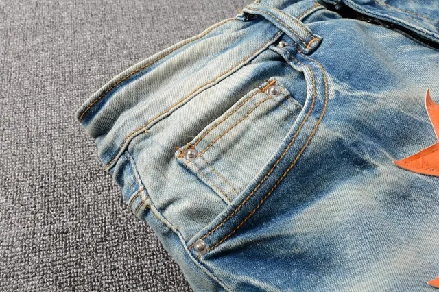 Jeans denim bleu orange lavé léger distressed motif appliqué étoile 10