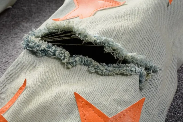 Jeans denim bleu orange lavé léger distressed motif appliqué étoile 14