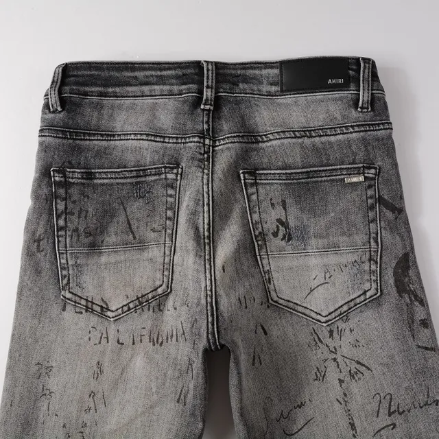 jeans slim-fit cinza lavado com estampa graffiti e design distressed 16