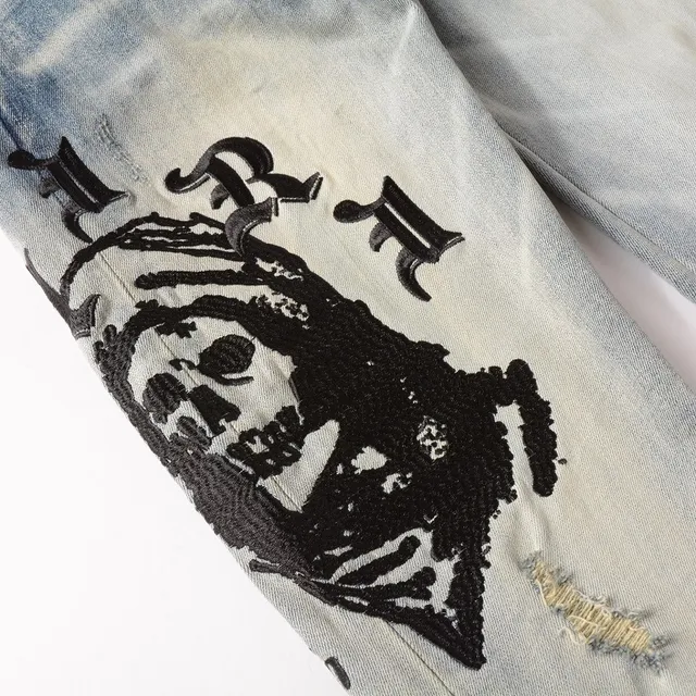 Distressed Light-Wash Graphic-Print Slim-Fit Jeans 18