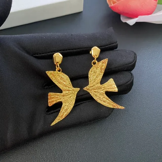 Gold and Silver Textured Swallow Drop Earrings 5