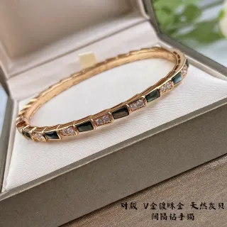 سوار ذهبي أسود مقسم هندسي باريه كريستال أكسنتس سوار